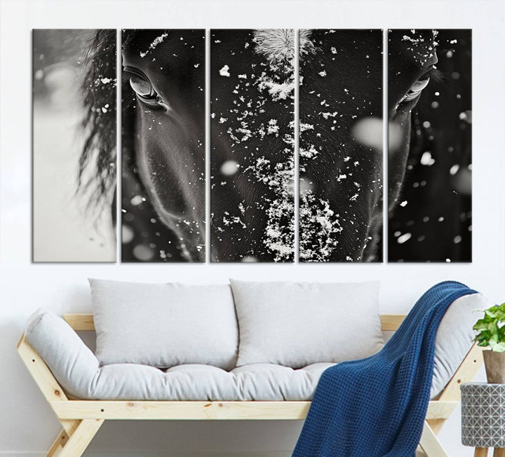 The Winter Horse Snow Wall Art Canvas Print, a black and white triptych showcasing a snow-covered horse's face, infuses the space with rustic cabin decor.