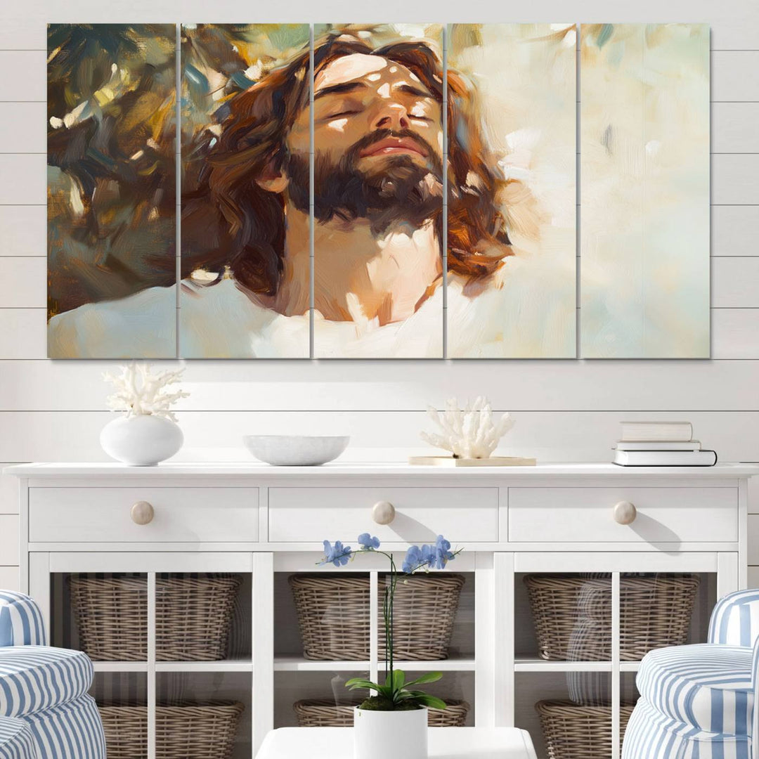 The Jesus Portrait Wall Art Canvas Print features a depiction of Jesus Christ with closed eyes, basking in sunlight. His expression exudes a peaceful, spiritual atmosphere against a blurred background.