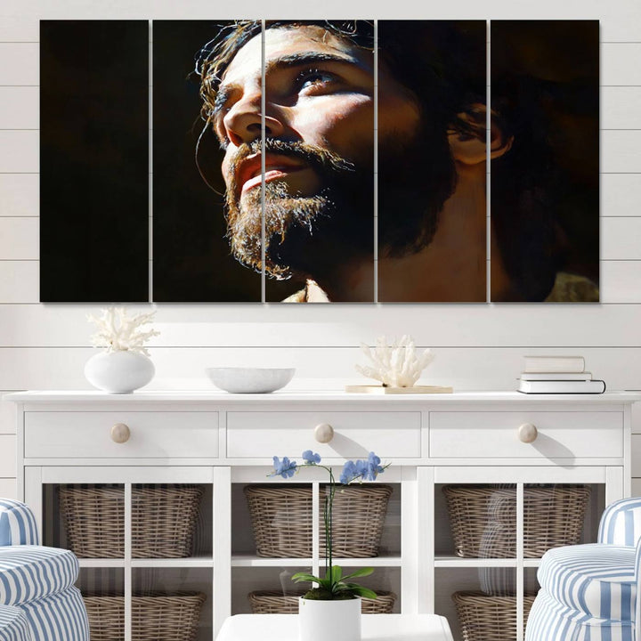 The Jesus Portrait Wall Art Canvas Print features a thoughtful depiction of Jesus Christ in an oil painting style, adding an inspirational religious touch to the decor.