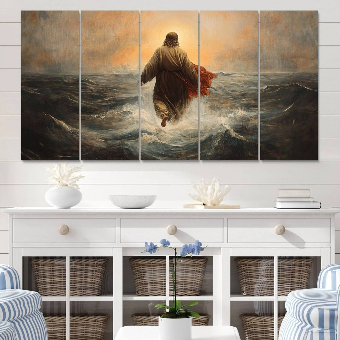 A modern living room is adorned with a triptych titled "Jesus Walking on Water, Christian Wall Art, Jesus Christ Walking on Oil Painting Style Print." The artwork, presented on museum-quality canvas, showcases vibrant colors and exquisite detail.