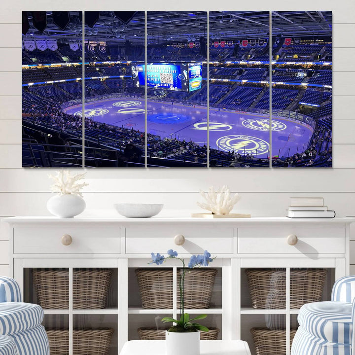 The wall art canvas print at Amalie Arena features team logos on ice, encapsulating the vibrant atmosphere of an NHL hockey stadium.