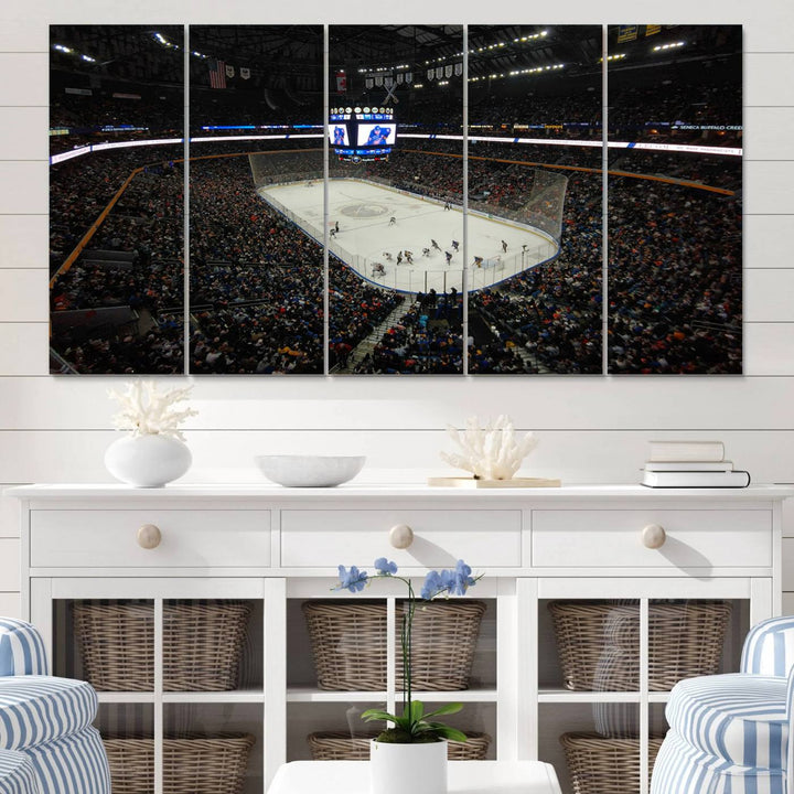 The nautical-themed room is enhanced by the KeyBank Center New York Buffalo Sabres Hockey Stadium Wall Art Canvas Print, a three-panel depiction of a bustling hockey arena with a gallery-quality finish. This canvas artwork, handmade in the USA, introduces an element of sporting elegance to your decor.