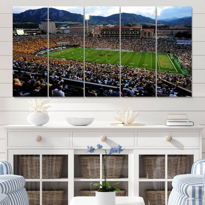 A canvas print captures the Colorado Buffaloes at Folsom Field, framed by mountains in the background.