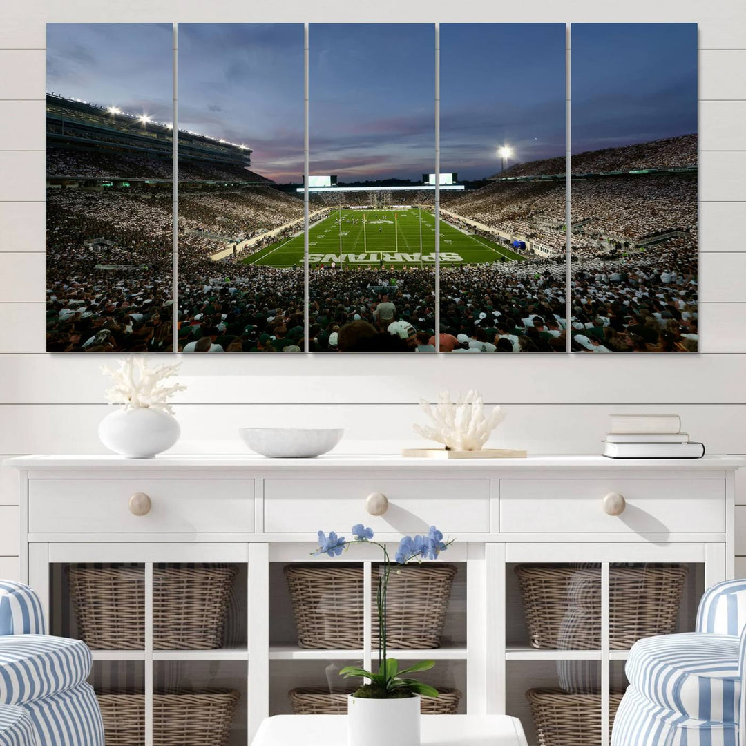 Wall art featuring a stadium at dusk with full stands—ideal for the Michigan State Spartans Football Team Canvas Print.