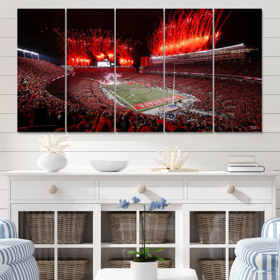 A vibrant red canvas art of a packed Ohio State Buckeyes stadium at night with fireworks.