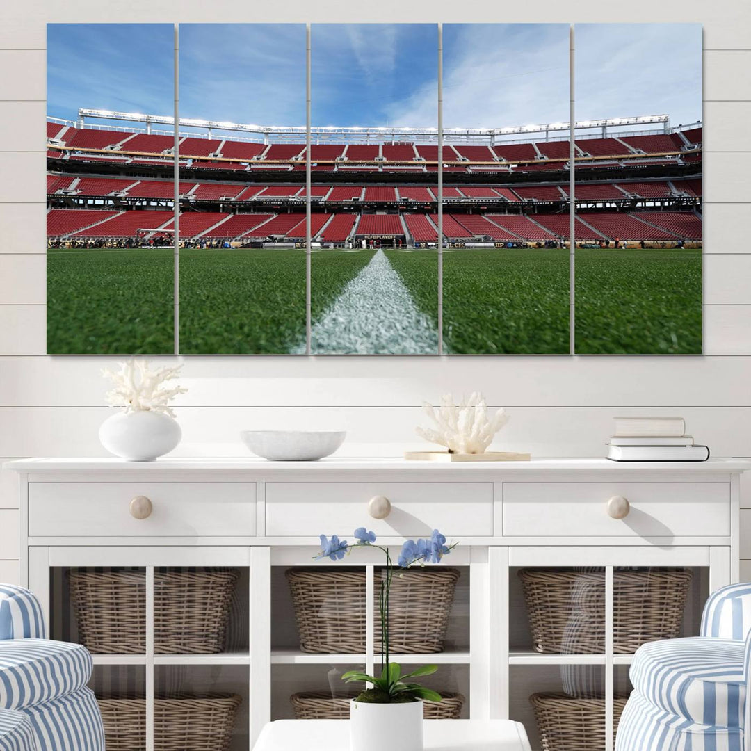 A canvas print of the University of Tulsa Golden Hurricane showcases H.A. Chapman Stadiums football field and red seats against a backdrop of a blue sky.