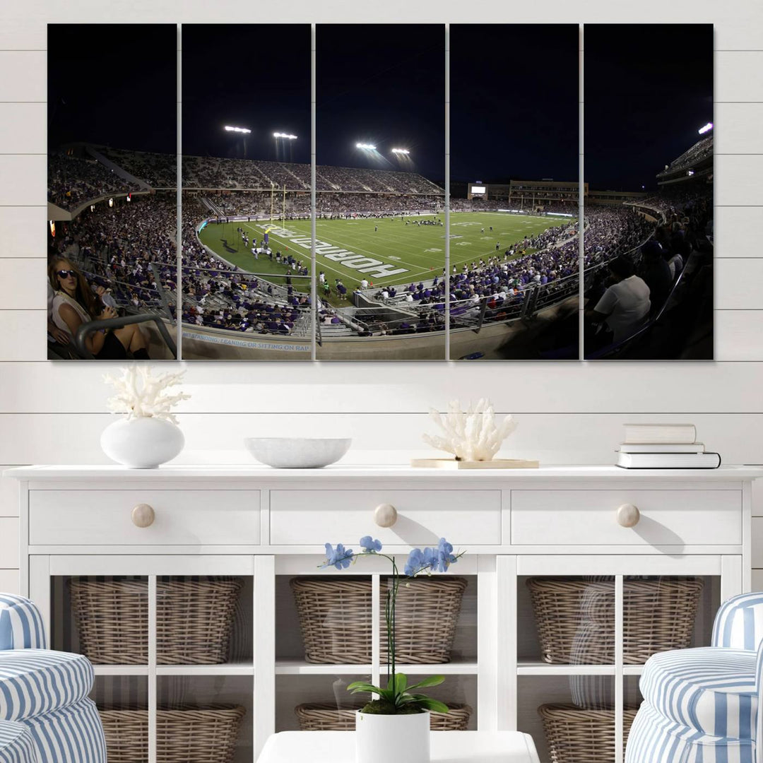 The wall art print features a night view of Amon G. Carter Stadium filled with TCU fans, showcased in the Horned Frogs Football Canvas Wall Art.