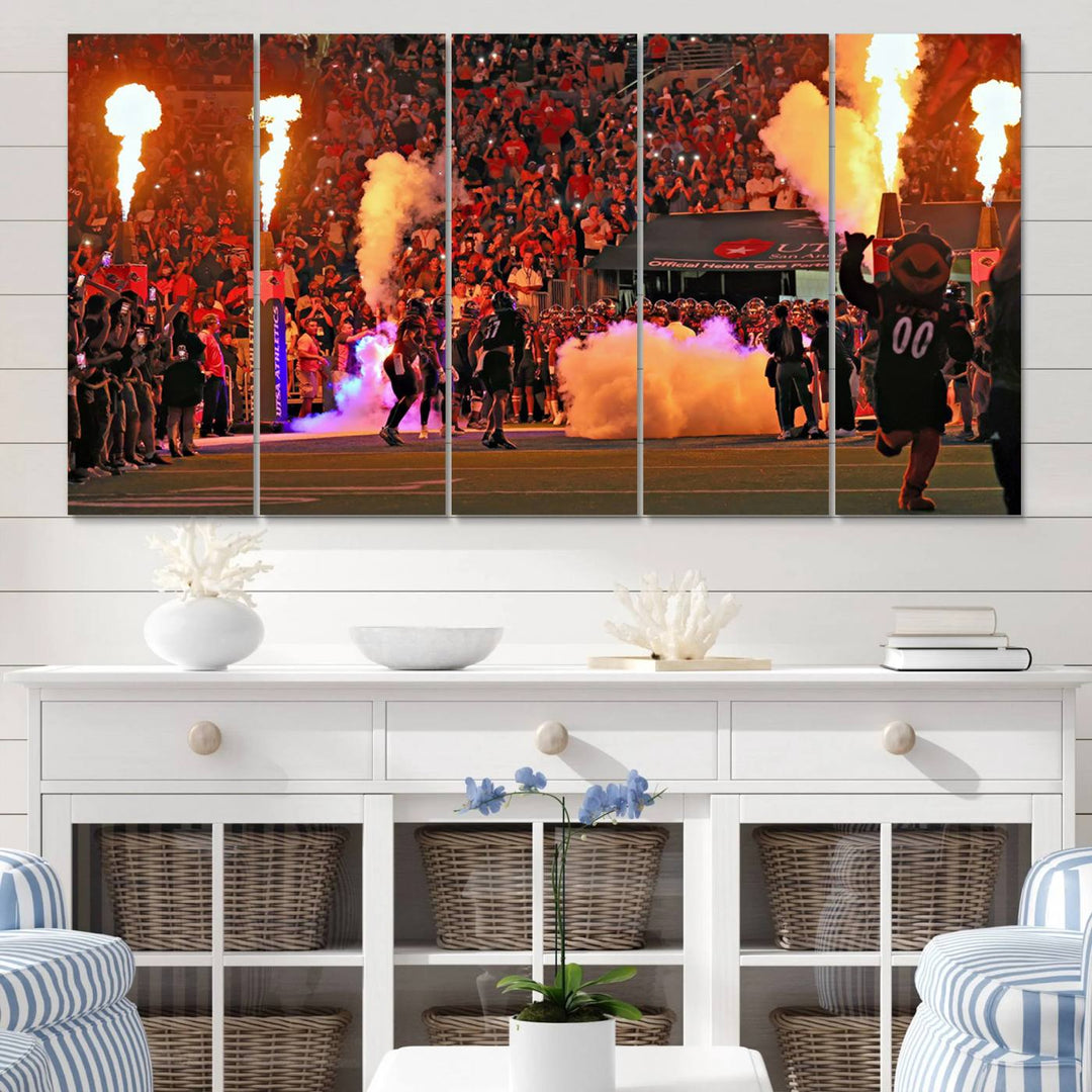 This canvas print captures the UTSA Roadrunners storming the Alamodome under smoke and fire.