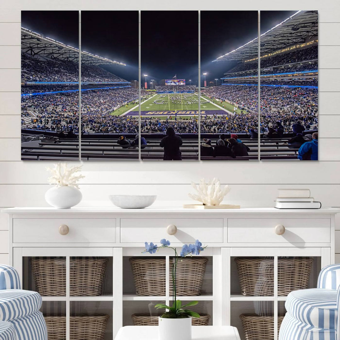 A canvas print titled The University of Washington Huskies Football depicts a packed Husky Stadium at night, as seen from the stands.