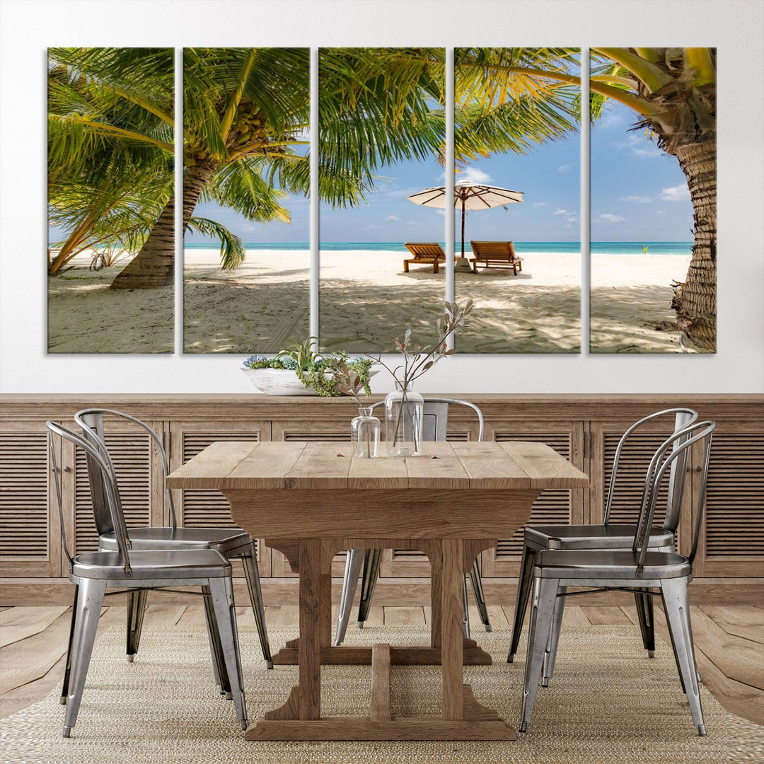 The canvas art print titled Lounge Chairs Palm Trees on Tropical Beach offers free shipping.