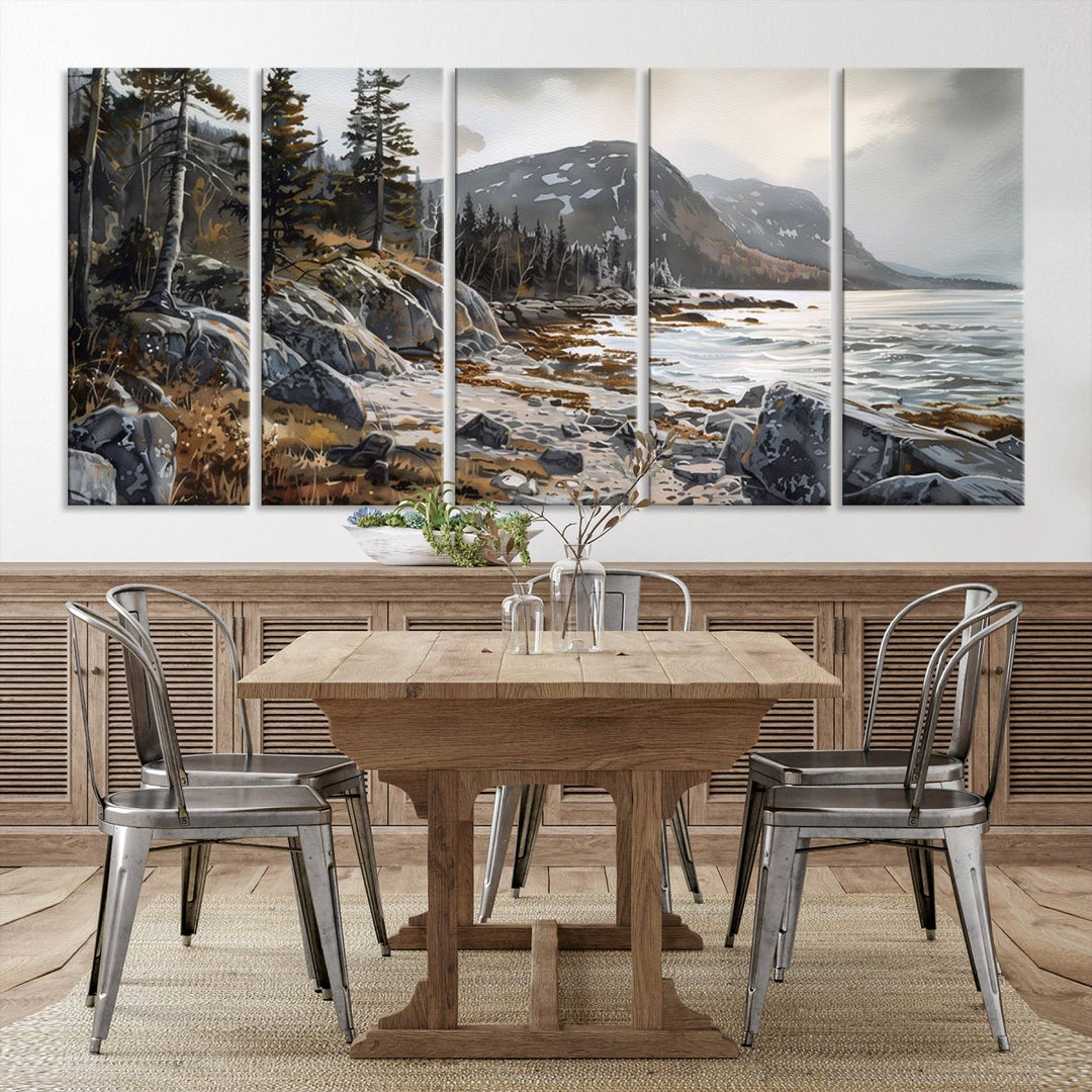 Framed wall art depicting Acadia National Parks rocky coast, trees, mountains, and sunlight over the sea; ready to hang.