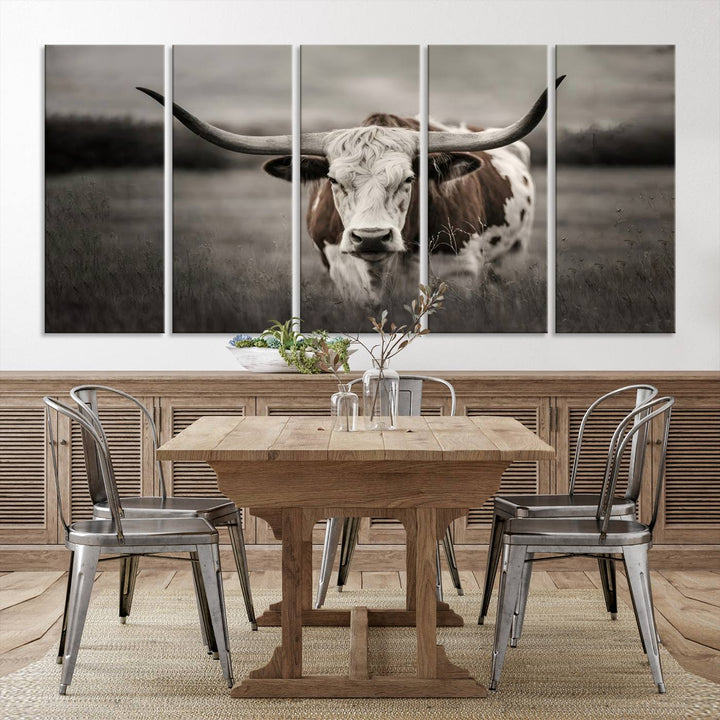 The Texas Longhorn Cow Canvas Wall Art Print adds a rustic touch to a living room.