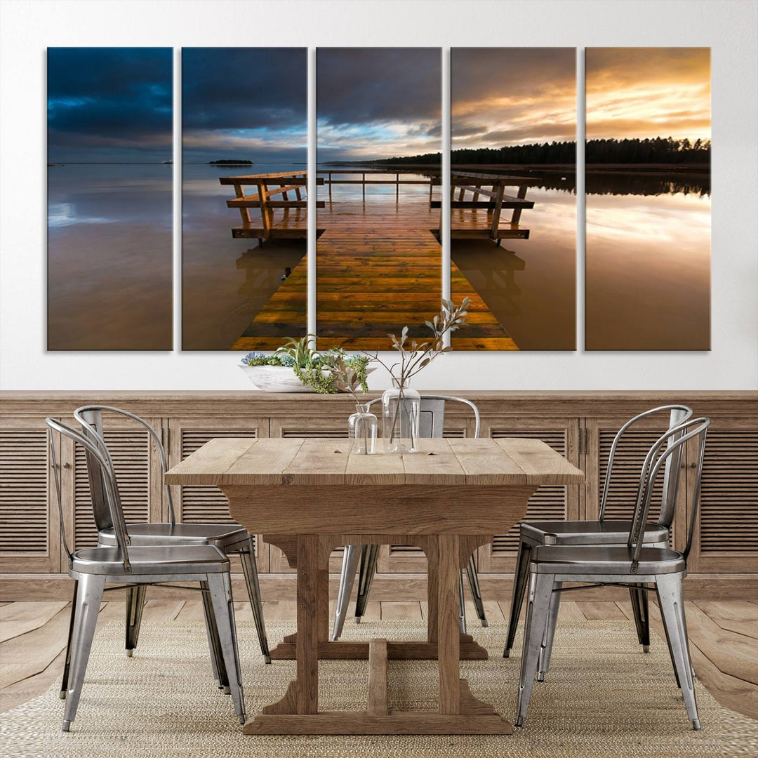 The "Serene Lake Pier at Sunset" landscape canvas print, crafted as ready-to-hang and framed wall art, enriches the contemporary setting by capturing the tranquility of a lakeside pier at sunset.