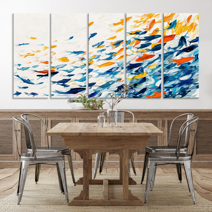 A colorful Abstract Fish Shoal Canvas Print hangs on the wall.