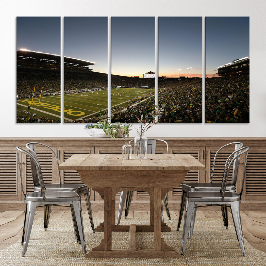 Canvas artwork depicting an Oregon Ducks football game at Autzen Stadium, capturing a sunset and packed stands.