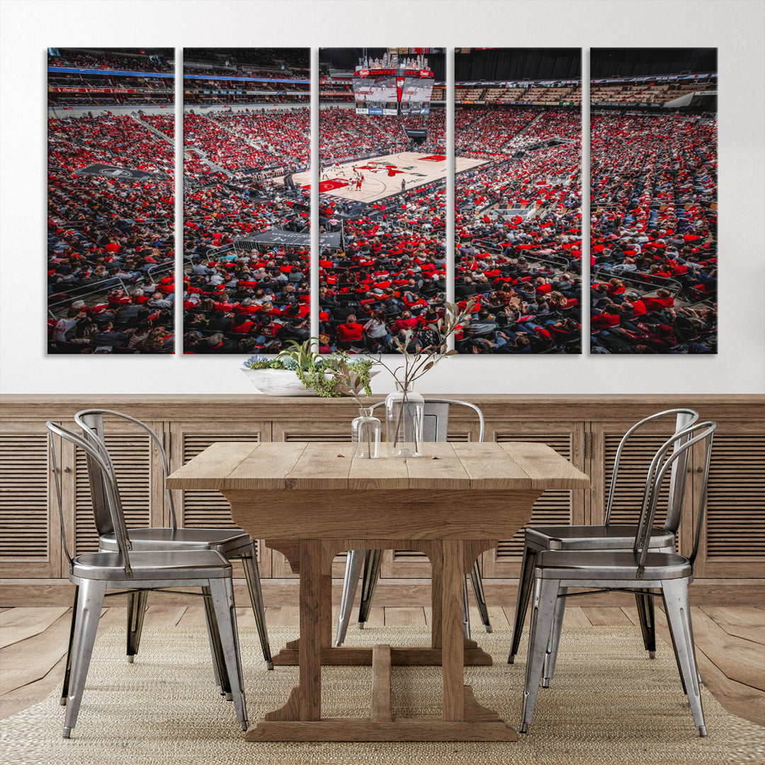 A painting of Louisville Cardinals fans in red at the KFC Yum Center Arena.