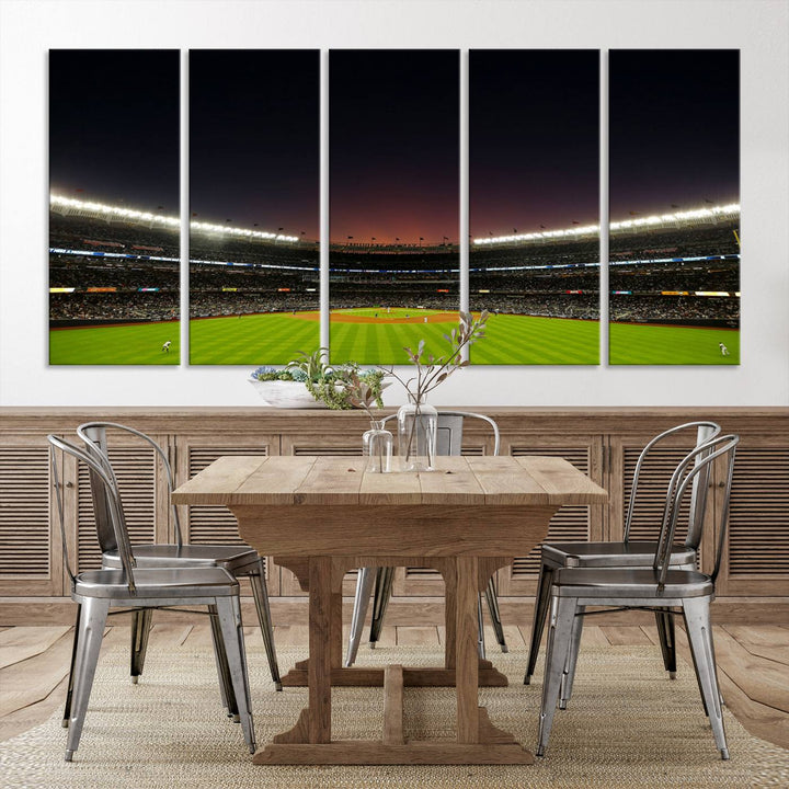 A night game at Yankee Stadium depicted on canvas beneath a sunset sky.