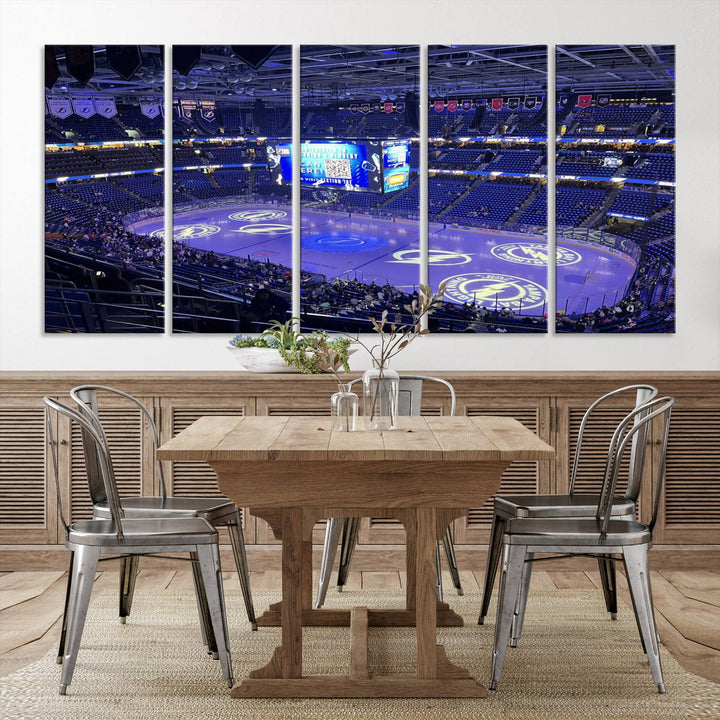 The wall art canvas print at Amalie Arena features team logos on ice, encapsulating the vibrant atmosphere of an NHL hockey stadium.