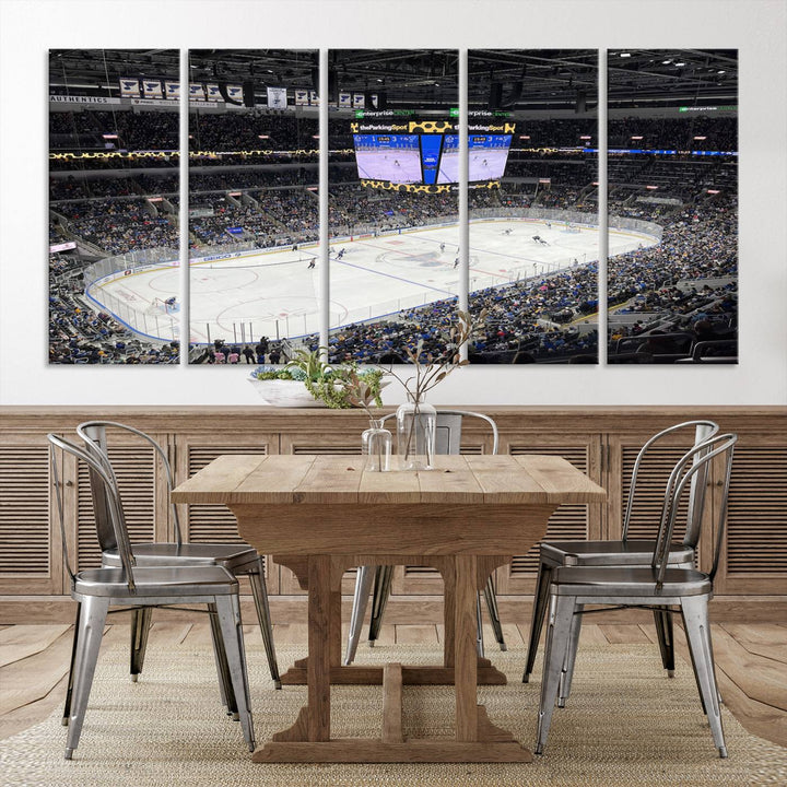 A large Enterprise Center canvas of a crowded hockey arena hangs prominently.