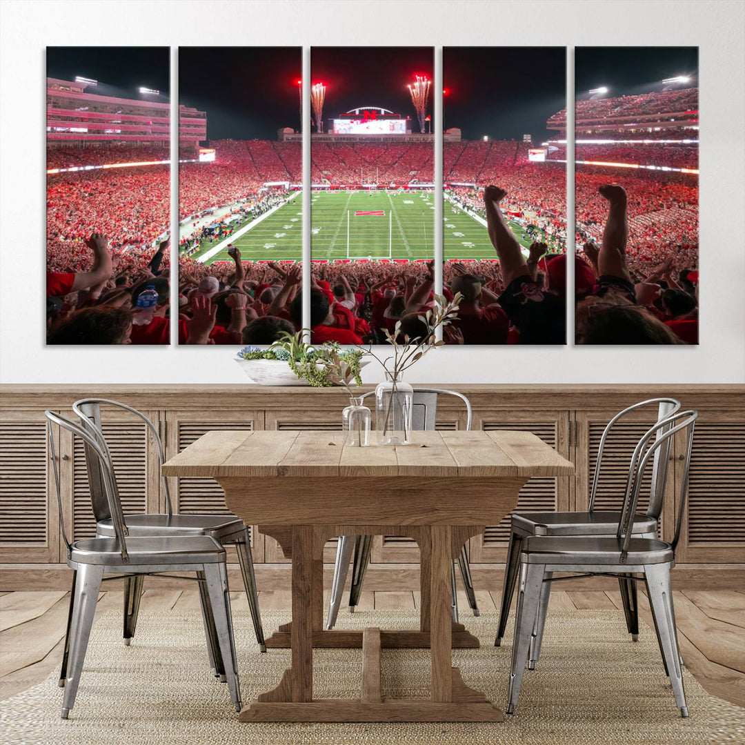 The University of Nebraska Cornhuskers Football Team Print, a vibrant three-panel canvas depicting Lincoln Memorial Stadium filled with enthusiastic fans from the end zone perspective, features a gallery-quality finish.