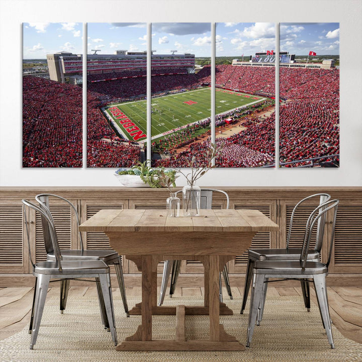 The University of Nebraska Cornhuskers Football Team Print showcases a vibrant triptych of Lincoln Memorial Stadium, depicting a packed football stadium filled with energetic fans. This handmade art piece is crafted in the USA and printed on premium canvas for a gallery-quality finish.