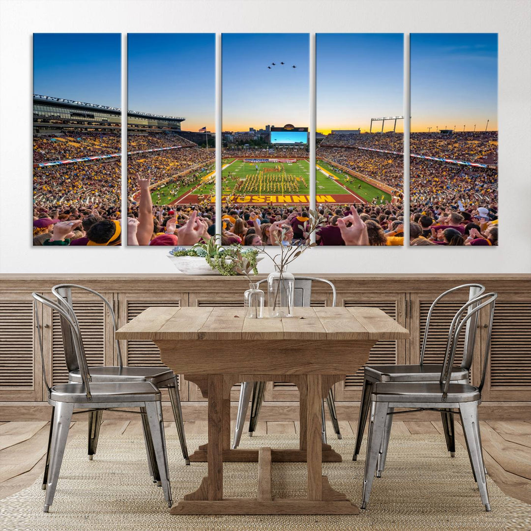 Canvas wall art featuring the University of Minnesota Football Team print, showcasing Huntington Bank Stadium at sunset with jets overhead.