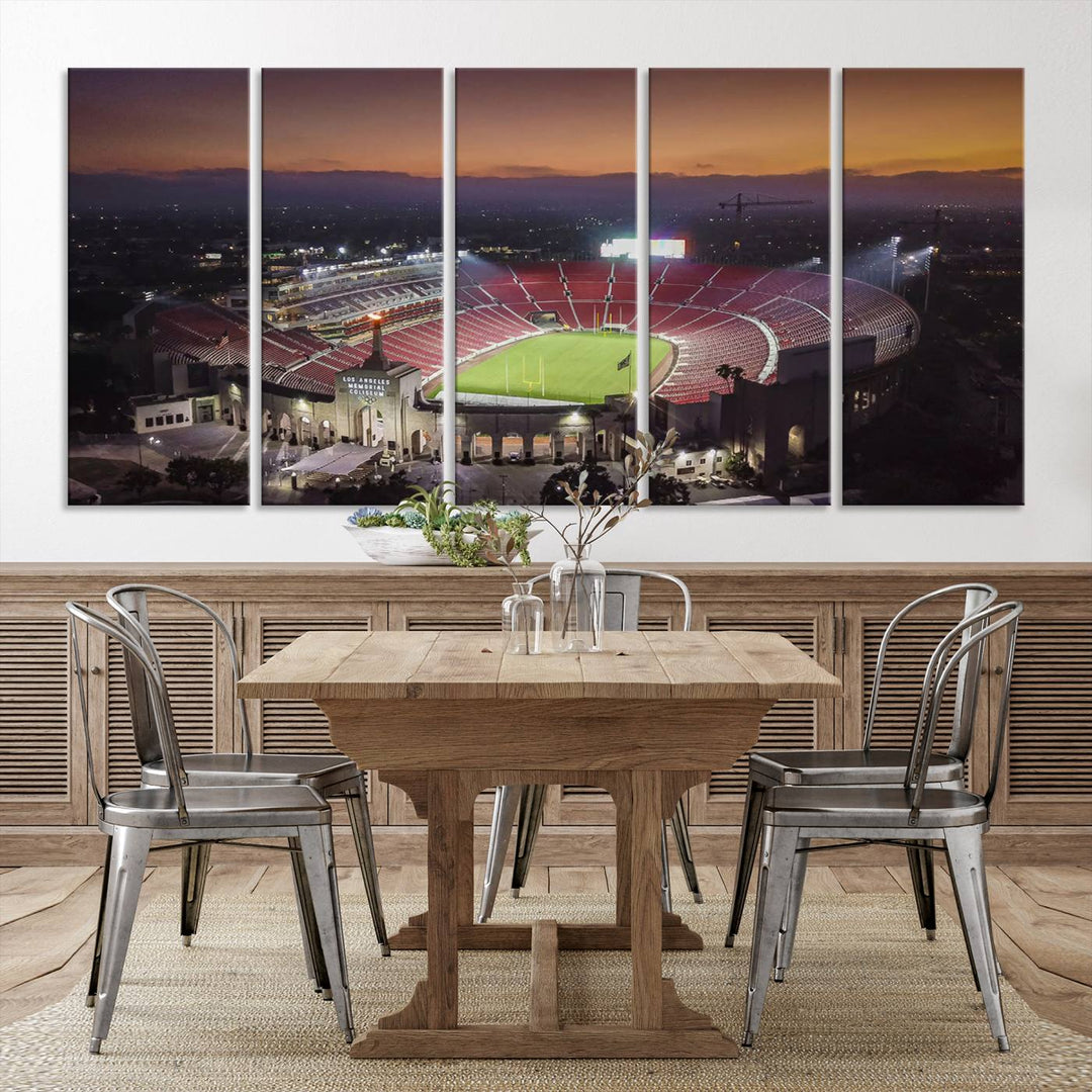 The USC Trojans Stadium canvas captures Memorial Coliseum at twilight, showcasing red seats and a green field beneath an orange sky.