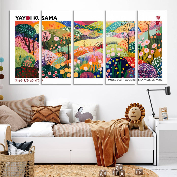 Three vibrant, abstract Yayoi Kusama wall art prints adorn a black wall, creating a perfect blend of contemporary décor.