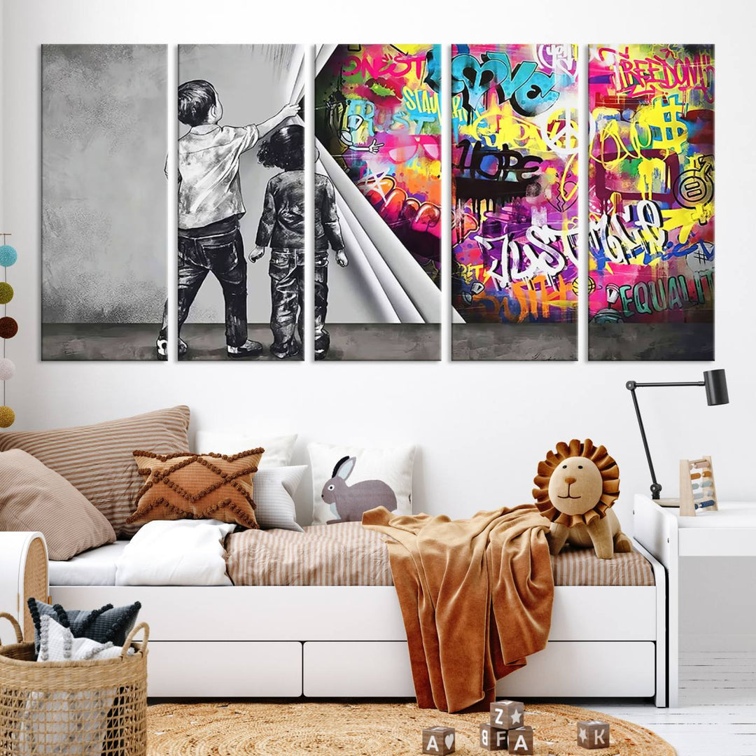 The Banksy Print - Street Art Canvas features a vibrant and bold image of two children lifting a curtain to reveal colorful graffiti. It's ready to hang, adding an urban modern decor vibe.