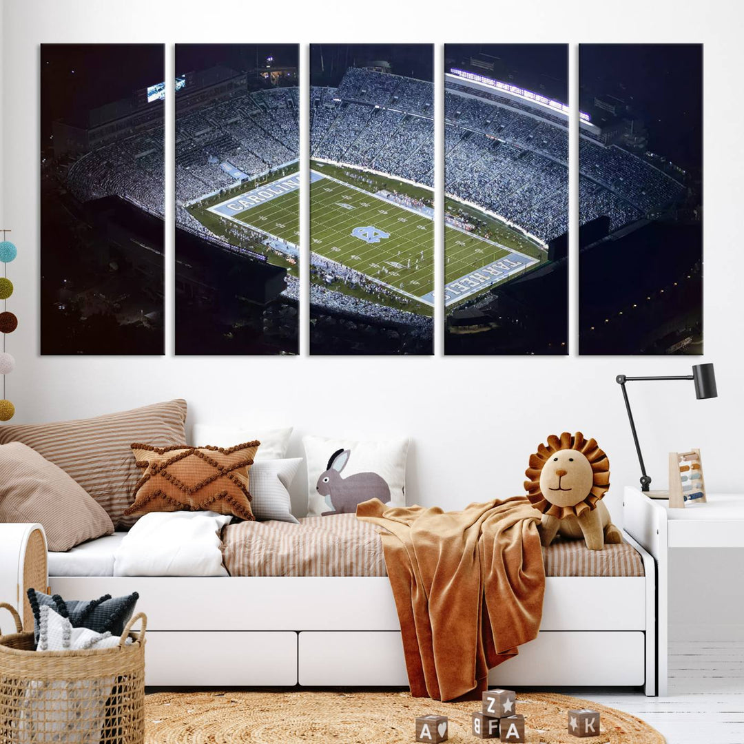 A University of North Carolina Tar Heels Football Team Print, showcasing Chapel Hill's Kenan Memorial Stadium, hangs in a modern dining room, adding a gallery-quality finish that enhances the entire space.