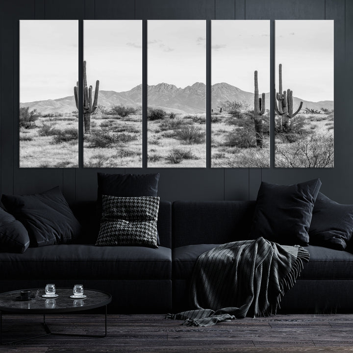 The modern living room showcases the "Black White Arizona Desert Canvas Wall Art Cactus Farmhouse Wall Art," a triptych consisting of gallery-wrapped, museum-quality black-and-white desert landscape photographs featuring cacti.