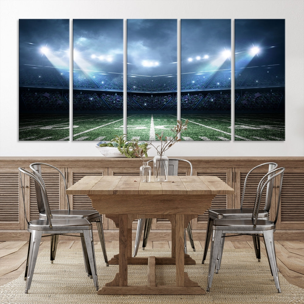 The *American Football Stadium Wall Art Canvas Print*, showcasing a lit football stadium, hangs prominently.