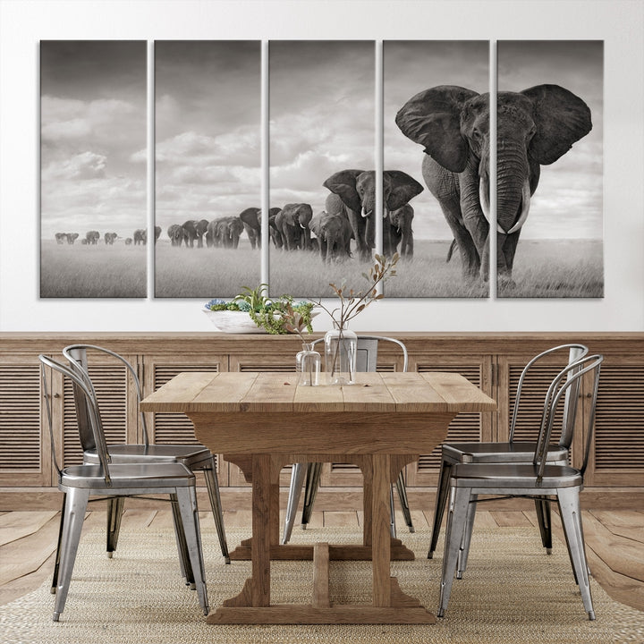 The Elephant Wall Art Canvas Print features a triptych of elephants in a savanna, elegantly displayed.