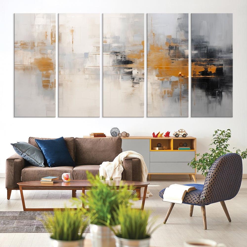 The Orange Pastel Abstract Wall Art Canvas Print, featuring a triptych of orange, white, and black hues, is elegantly displayed on museum-quality canvas.