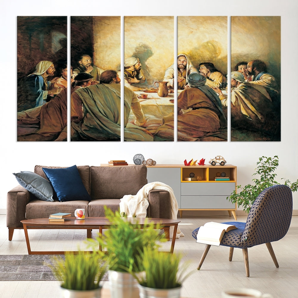 A cozy living room showcases a three-panel canvas titled "The Last Supper Canvas Wall Art – Sacred Religious Masterpiece," depicting people gathered at a table reminiscent of the Last Supper.