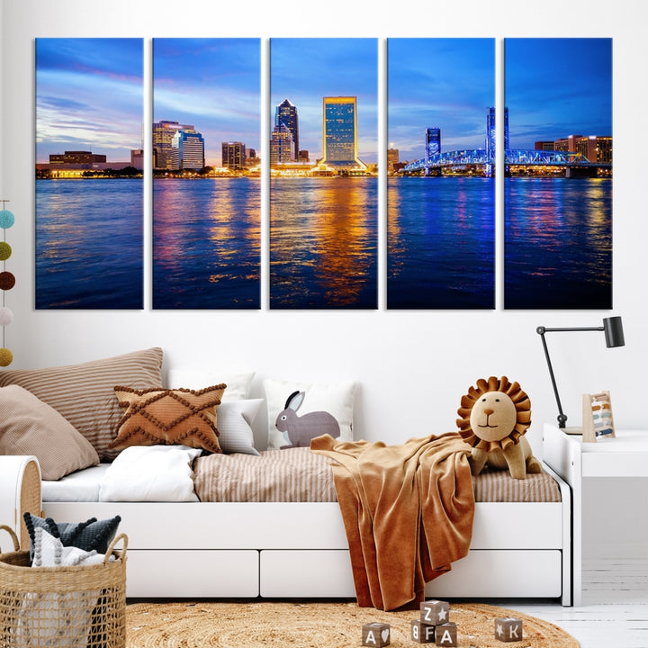 A cozy living room features the Jacksonville Wall Art Canvas Print, a large triptych crafted on museum-quality canvas that beautifully depicts the Jacksonville city skyline at sunset.