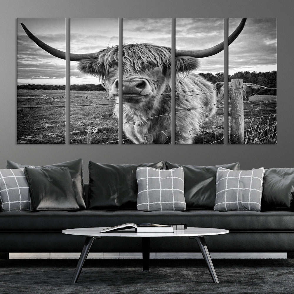 The "Scottish Highland Cow Canvas Wall Art Farmhouse Decor" adds a touch of rustic charm to your living room wall above the couch.