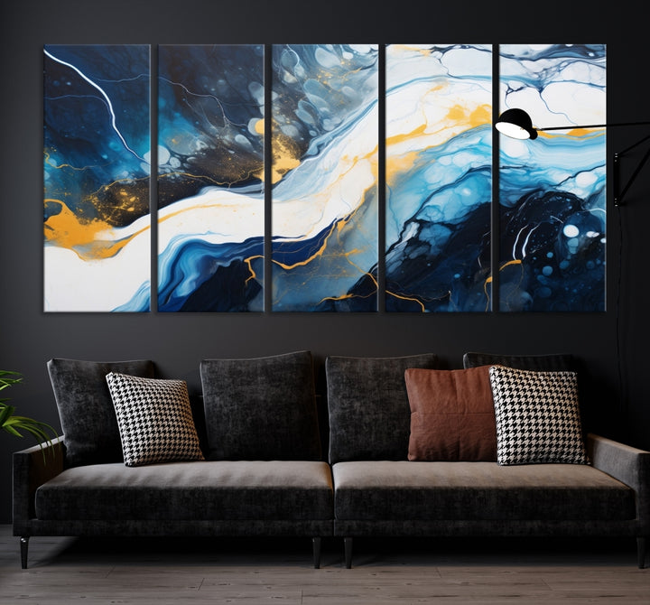 The Navy Blue Abstract Wall Art Canvas Print, displaying an exquisite array of blue, white, and gold swirls, is crafted on museum-quality canvas and enhances the space with its sophisticated elegance.