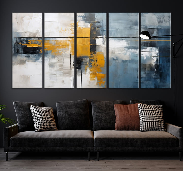 The Orange Abstract Wall Art Print features a series of white, blue, black, and yellow blocks arranged in a triptych format on museum-quality canvases. Proudly made in the USA and offered with free shipping.