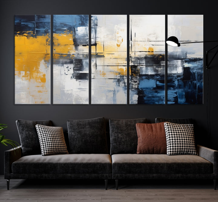 The Yellow Orange Blue Abstract Wall Art Print on gallery-wrapped, museum-quality canvases adds a vibrant touch to the room.