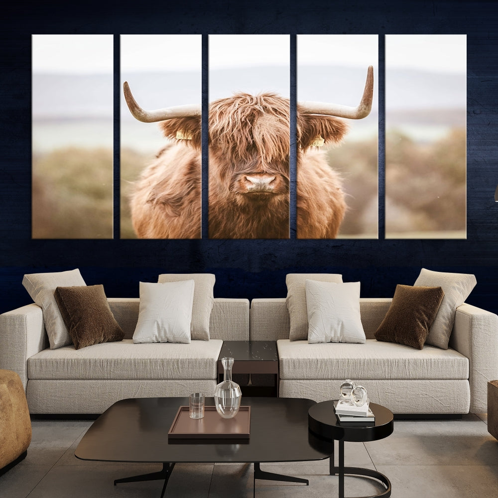 Canvas wall art featuring a Highland cow with long, shaggy fur in natural pastel tones, ready to hang.