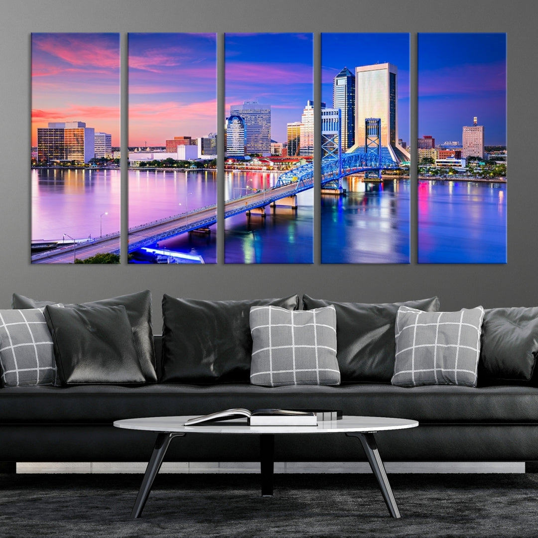 The Jacksonville Wall Art Canvas Print, showcasing the Jacksonville cityscape over a river at sunset, is elegantly crafted on museum-quality canvas with a UV-protective coating. Ready to hang, it elevates your space with its sophisticated charm.