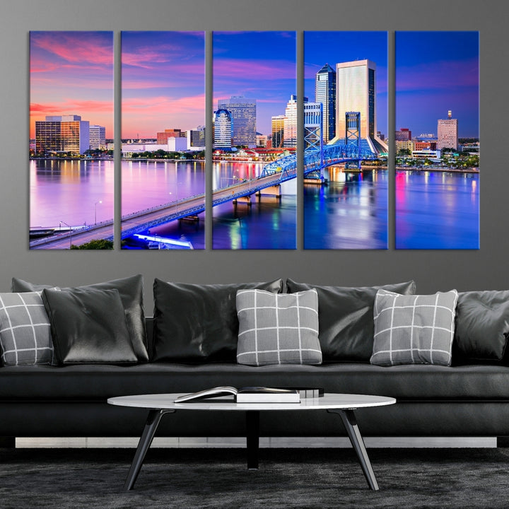 The Jacksonville Wall Art Canvas Print, showcasing the Jacksonville cityscape over a river at sunset, is elegantly crafted on museum-quality canvas with a UV-protective coating. Ready to hang, it elevates your space with its sophisticated charm.