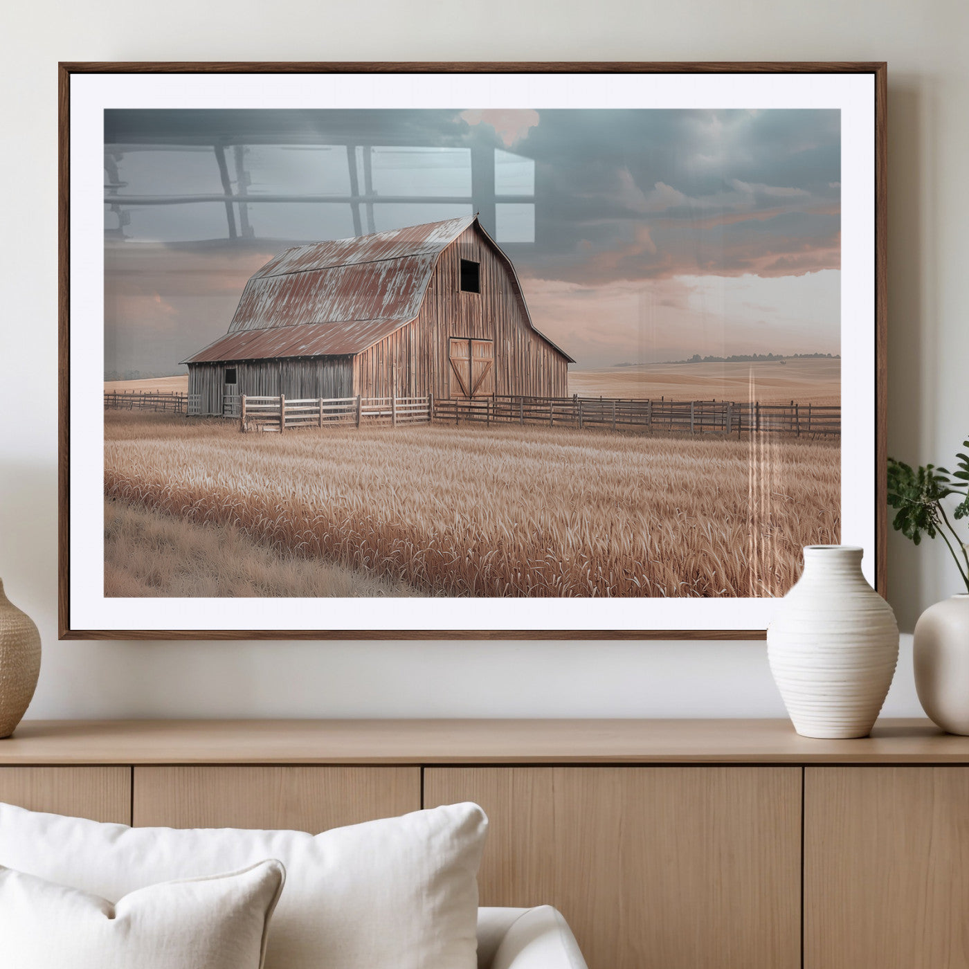 Framed canvas of a rustic barn in a golden wheat field under soft skies, ideal for vintage farmhouse or country-style wall decor.