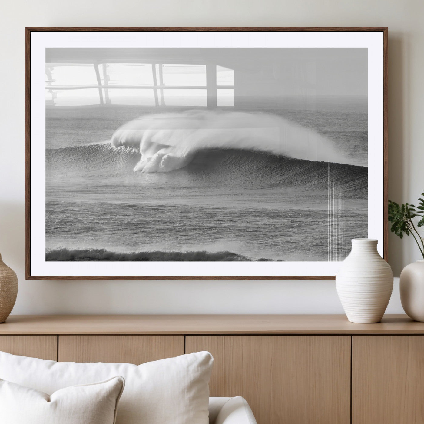 A dramatic black and white ocean wave crashing with immense force, capturing the raw power and movement of the sea in a bold seascape.
