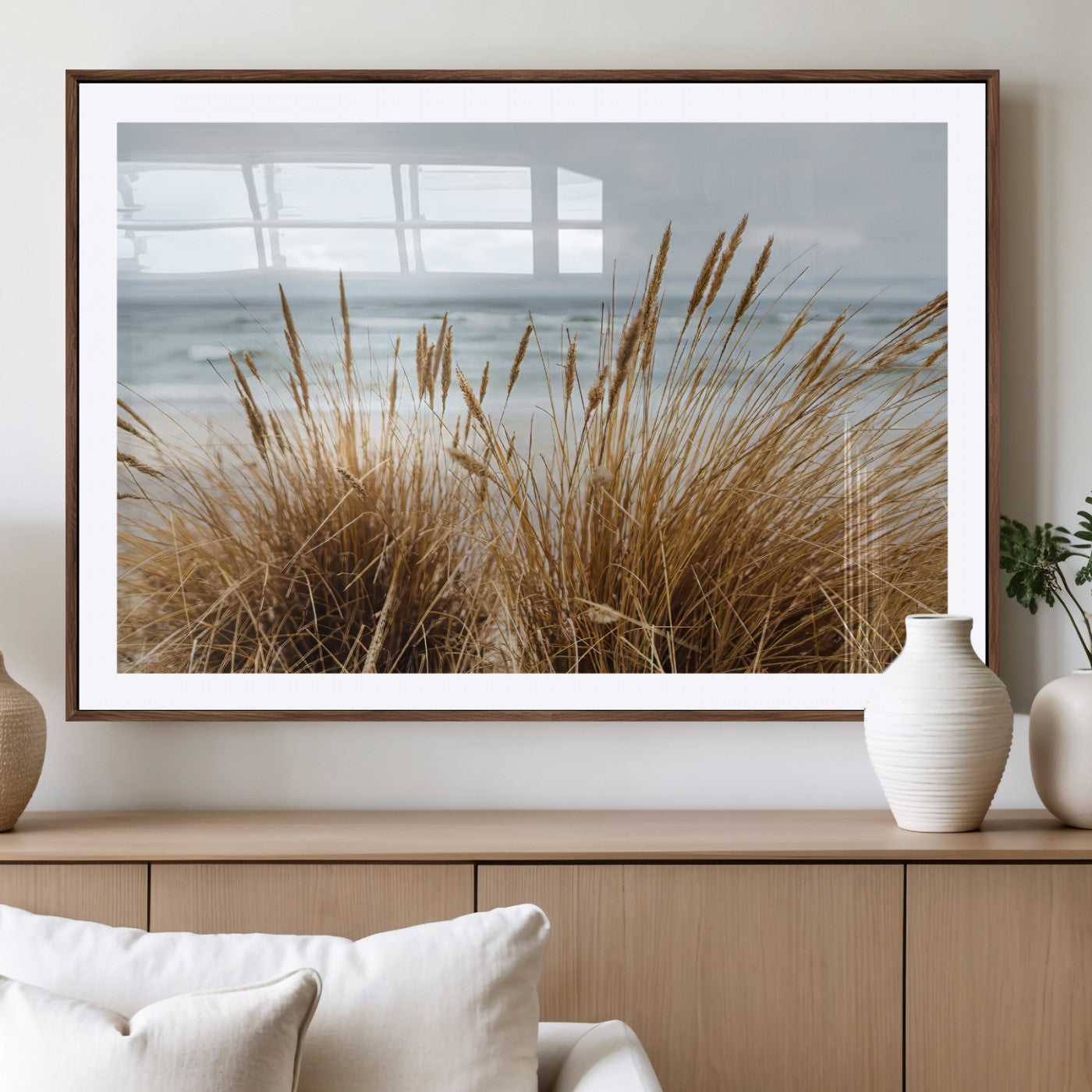 Canvas of golden beach grass swaying by the ocean under a soft cloudy sky, perfect for neutral-toned or coastal minimalist decor.