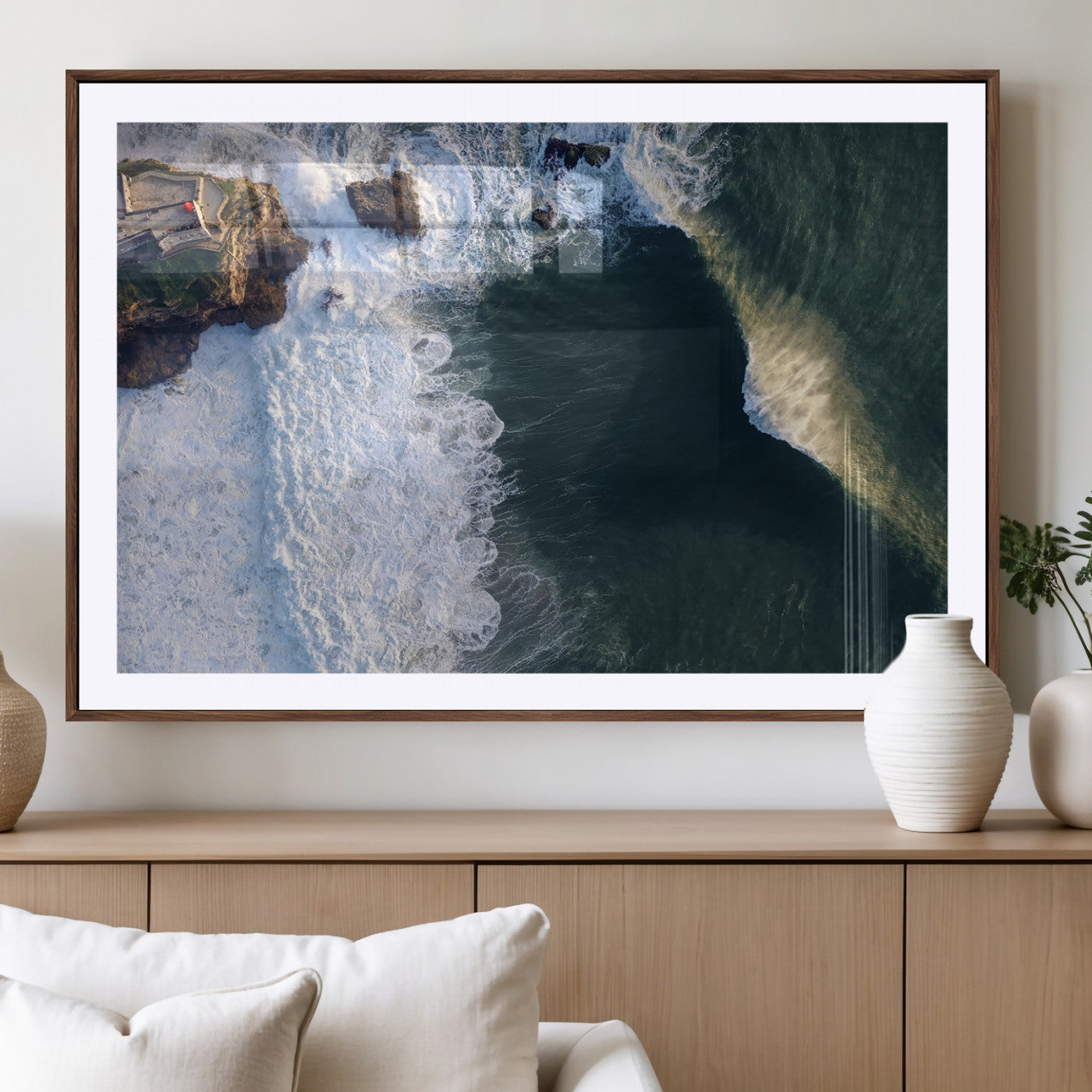 Canvas showing an aerial view of crashing waves along the Nazaré coastline, perfect for dramatic coastal or ocean-themed home decor.