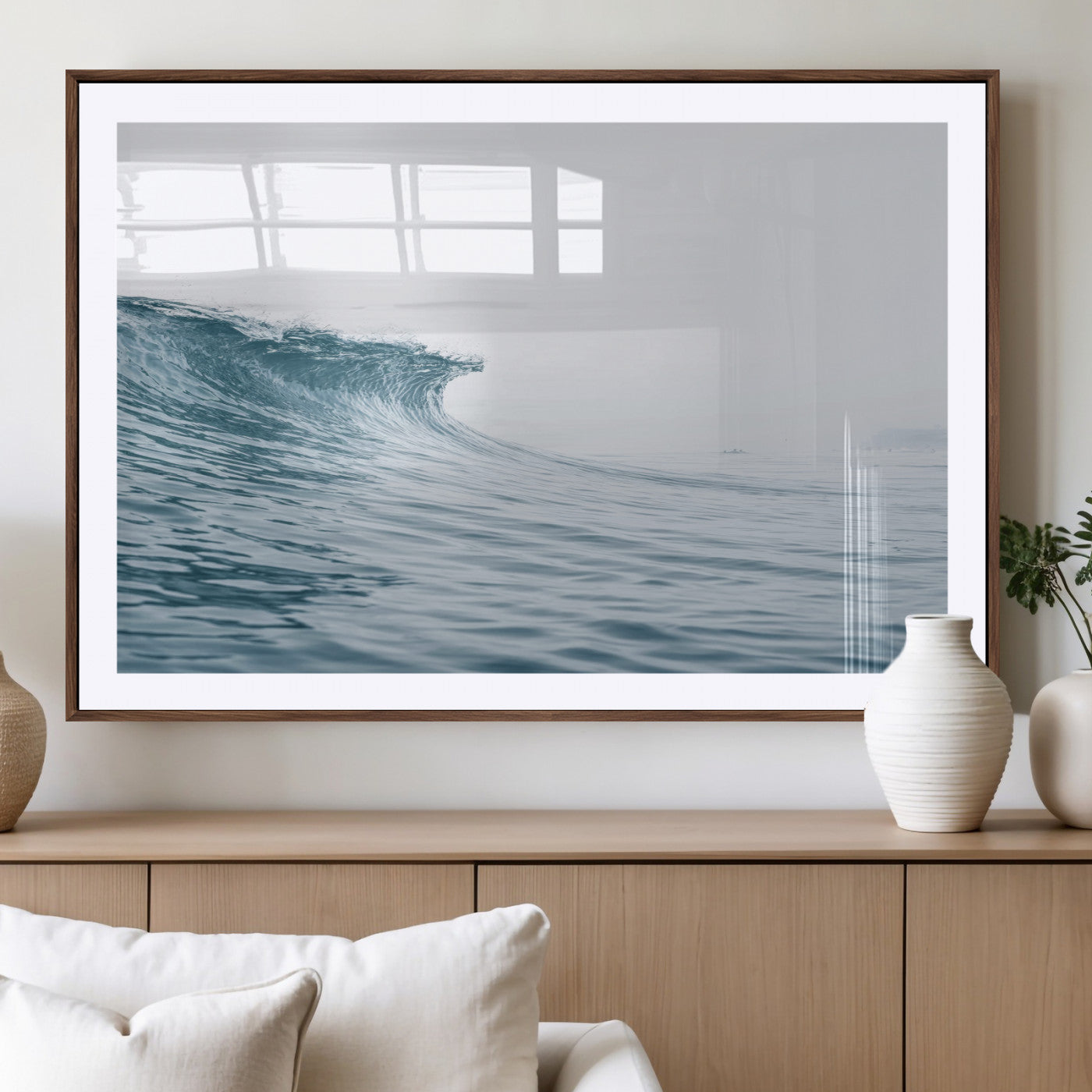 A single ocean wave curling in soft blue tones under a misty sky, ideal for coastal or minimalist home wall decor.
