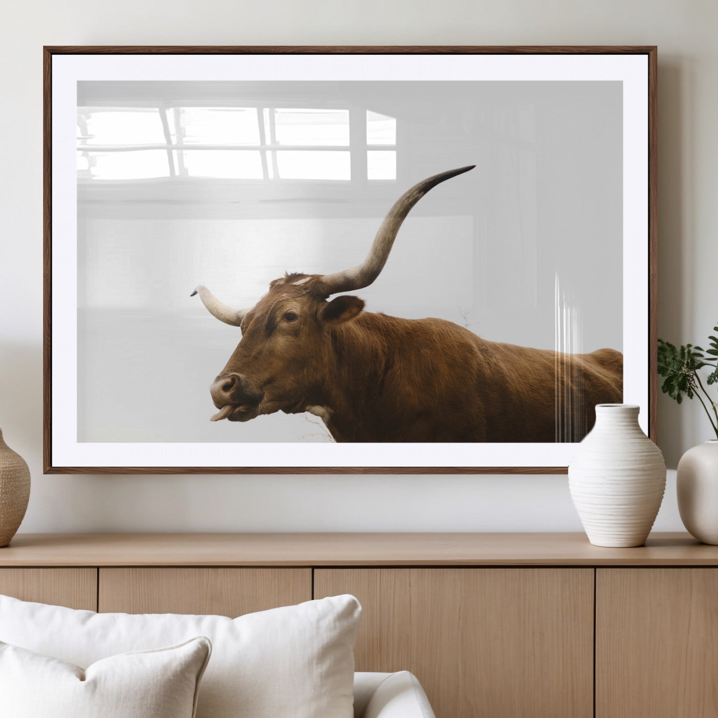 Side view of a brown Longhorn cow with curved horns on white background, perfect for rustic farmhouse or western-style home decor.