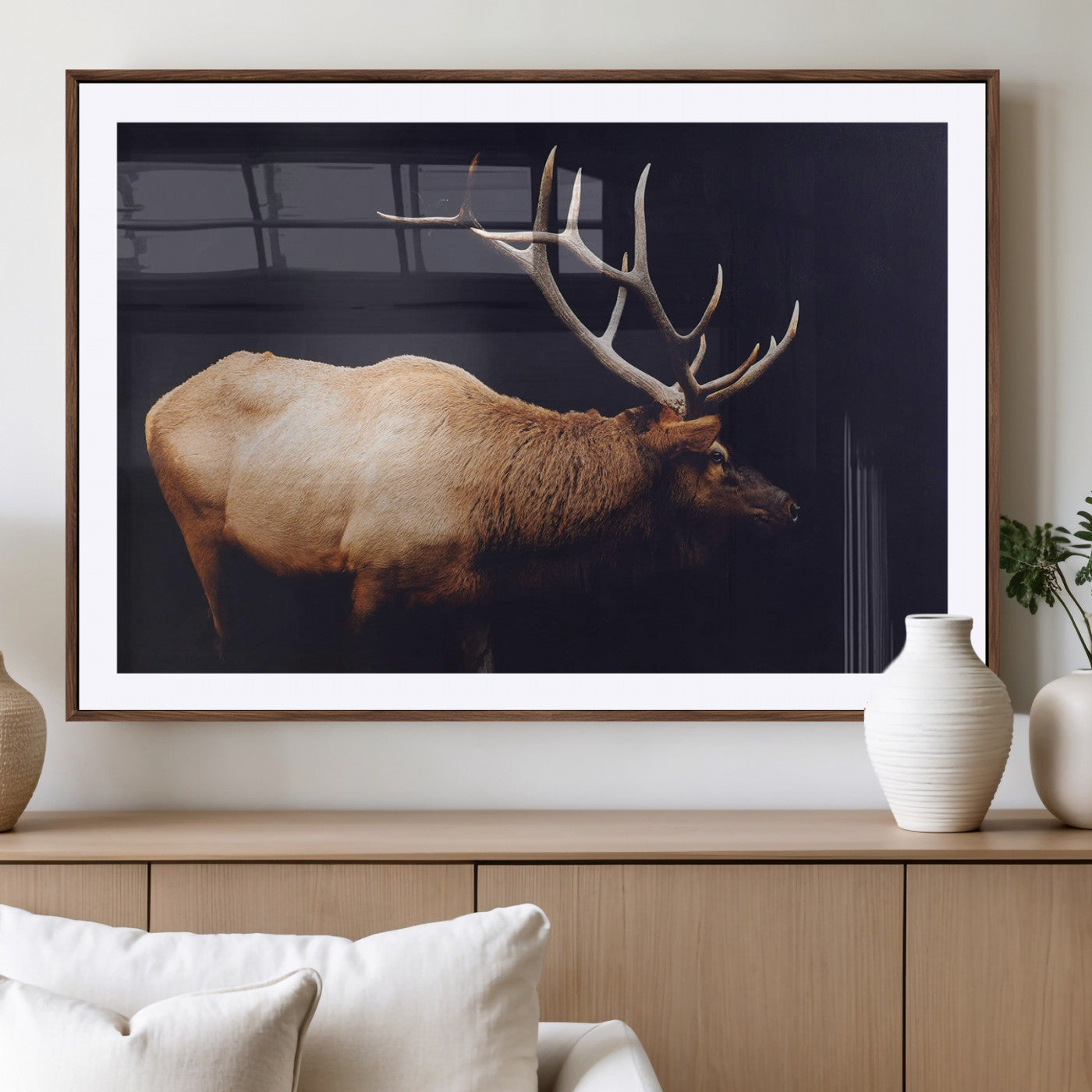 Side profile of an elk with large antlers on dark background, creating a bold rustic statement for cabin or Western-themed decor.